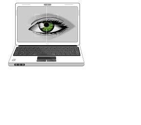 Laptop z zielonym okiem na ekranie, symbolizującym nadzór lub skanowanie. Kluczowe obiekty: laptop, oko.