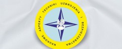 Okrągły emblemat z napisem "ASPEKTY NAUKOWE TECHNIKI UZBROJENIA I BEZPIECZEŃSTWA". W centrum orzeł.
